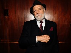 Ask Attorney Bruce Margolin older dapper man with hat and beard in suit wearing a red weed tie