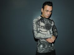 Jiu-Jitsu Expert Eddie Bravo Fights the Good Fight eddie bravo young man with dark hair and 10th planet long-sleeve jiu-jitsu shirt