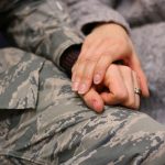 Feds Allow Marijuana PTSD Study To Move Forward military man wearing a ring holding hands with loving female