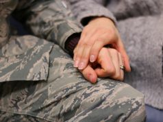 Feds Allow Marijuana PTSD Study To Move Forward military man wearing a ring holding hands with loving female