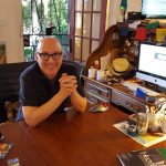 Steward Richlin is a Man for All Mom-and-Pops Stewart Richlin bald man with glasses smiling next to his dog at his home office