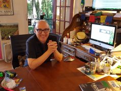 Steward Richlin is a Man for All Mom-and-Pops Stewart Richlin bald man with glasses smiling next to his dog at his home office