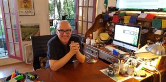 Steward Richlin is a Man for All Mom-and-Pops Stewart Richlin bald man with glasses smiling next to his dog at his home office