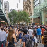 Is Canna Christmas (420) Green Answer to Black Friday? large crowd of people shopping on black friday at outdoor mall