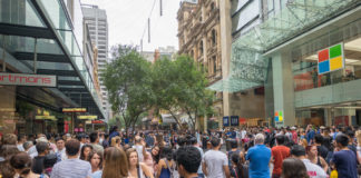 Is Canna Christmas (420) Green Answer to Black Friday? large crowd of people shopping on black friday at outdoor mall