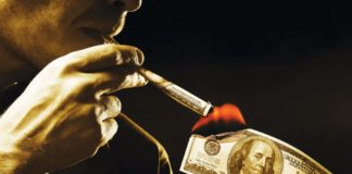 Can Regulation Turn Your Investment Into Smoke? man burning hundred dollar bill and smoking hundred dollar joint