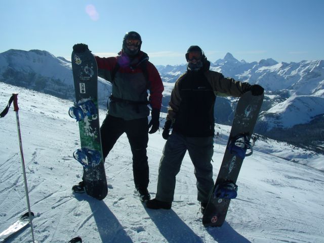 two snowboarders on a mountain