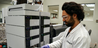 The Trouble With Marijuana Testing Loading sample tray for pesticide analysis 2 Steep Hill Lab mgretailer web