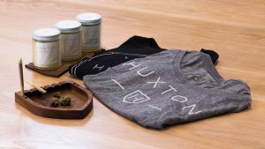 The Huxton Love Set with keepsake T-shirt, candle, and ashtray of solid walnut