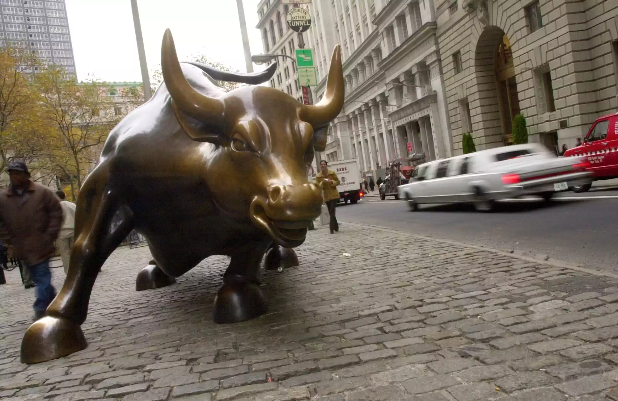 A bronze sculpture of a bull is displayed on Broadway in the financial district. Chris Hondros/Getty Images News