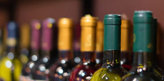 Why Cannabis and Alcohol Sales Should Never, Ever be Co-located wine bottles mg magazine