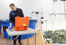 Orange Photonics Illuminates Field-Testing With LightLab Orange Photonics staffer working