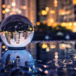 5 Signs It’s Time to Rebrand Glass ball reflecting city at night Clover Collective rebranding Ake13bk mg Magazine mgretailer