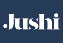 Jushi Holdings Adjusts CEO Compensation jushi logo white text dark blue background