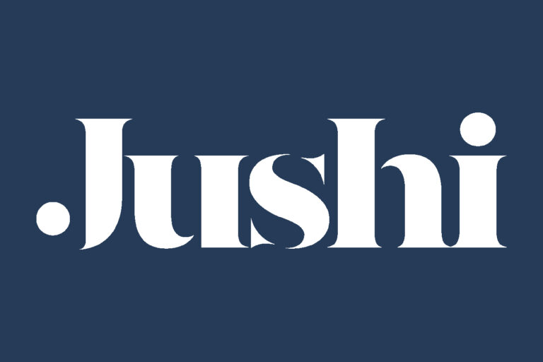 jushi logo white text dark blue background