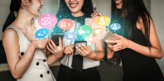 How to Drive Social Media Engagement with Authenticity women using social media Blue-Planet Studio Shutterstock mg Magazine mgretailer