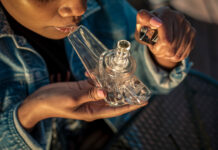 GRAV: Growth on Their Own Terms Woman using GRAV glass mg Magazine