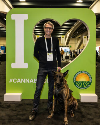 NCIA Cannabis Summit man with dog Mike Rosati photo mg Magazine