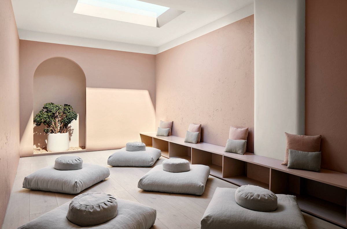 soft pink room with gray floor pillows
