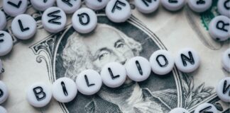 The Cannabis Industry’s Massive Potential for 2022 white and black letter beads spelling billion on top of a one dollar bill