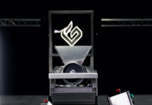 GreenBroz Inc. Launches the Model G Precision Grinder + Destemmer, Transforming Cannabis Pre-Roll and Extraction Processing Greenbroz industrial grinder front facing view of the stainless steel machine with the green broz G lit up above the grinder