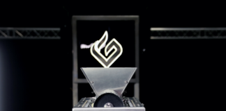 GreenBroz Inc. Launches the Model G Precision Grinder + Destemmer, Transforming Cannabis Pre-Roll and Extraction Processing Greenbroz industrial grinder front facing view of the stainless steel machine with the green broz G lit up above the grinder