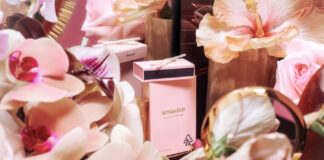 Sundazed Debuts Premium Line of Cannabis Pre Rolls First to Integrate Instagram Filters Into Packaging a light pink preroll box with a matching pack of matches surrounded by pink flowersh