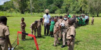 Humboldt Seed Company’s Jamaica Project Photo Gallery 18-Tyrone-Alleyne-of-Pure-Jamaican-donating-soccer-balls-to-local-Jamaican-school.
