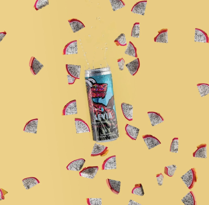 product image tan background featuring image of levia dragon fruit seltzer can surrounded by pieces of dragon fruit floating around the can