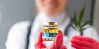 Feds Request New Cultivators to Supply NIDA Researchers cannabis science with CBD oil and red gloves