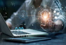 The CLIMB Act Would Greatly Expand Access to Financial Services Data security. Businessman use laptop and touching digital padlock with data protection. Big data network. Technology and cyber security on virtual interface.