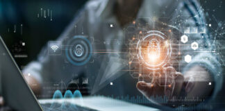 The CLIMB Act Would Greatly Expand Access to Financial Services Data security. Businessman use laptop and touching digital padlock with data protection. Big data network. Technology and cyber security on virtual interface.