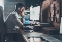 3 Big Marketing Missteps to Avoid in New and Emerging Markets business man with hands in face in front of computer