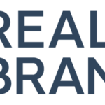 Real Brands Signs Letter of Intent to Acquire Assets of Boulder Botanical white background blue text reading real brands inc and a logo to the left featuring a white outline of leaves in a light blue circle
