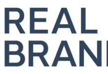 Real Brands signs def. agreement to acquire Colo. supplier of CBD, herbal supplements to major retail chains white background blue text reading real brands inc and a logo to the left featuring a white outline of leaves in a light blue circle