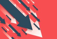 What We Can Learn from the 7% Decline in Consumer Spending blue and white arrows pointing downward on red background