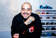 Forbes Unveils Cookies Co-Founder and CEO Berner as First Cannabis Executive Featured on Its Iconic Cover photo of rapper berner showcasing his cookies tattoo and wearing a big smile with a thick mustache and a bald head
