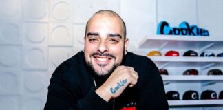 Forbes Unveils Cookies Co-Founder and CEO Berner as First Cannabis Executive Featured on Its Iconic Cover photo of rapper berner showcasing his cookies tattoo and wearing a big smile with a thick mustache and a bald head