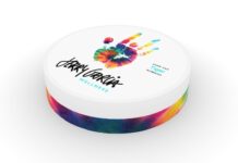 New CBD Brand Worthy of the Jerry Garcia Name Comes to Market white background tie dye container with jerry garcia logo on the top beneath a tie dye hand