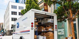 New Federal Bill Could Allow Small Growers to Sell Over State Lines August 10, 2019 San Francisco / CA / USA - USPS delivery van stopped in front of a UPS location, unloading Amazon packages