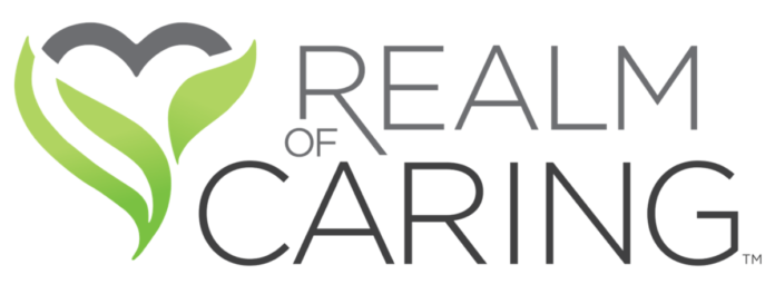 realm of caring logo white background gray text with a green heart