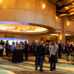 MJ Unpacked Bets Big and Wins on Blend of Business and Culture MJ-Unpacked-2022 conference room networking event