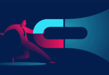 When Wallets Shrink, You Must Attract More Wallets businessman with giant magnet. attracting money, investments, lead generation,magnetism business concept