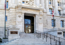 D.C. Lawmakers Advance Business-Friendly Bill for the Capital Washington D.C., USA - March 1, 2020: The entrance of John A. Wilson Building, which houses the Executive Office of the Mayor and the Council of the District of Columbia.
