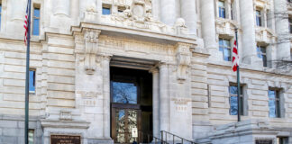 D.C. Lawmakers Advance Business-Friendly Bill for the Capital Washington D.C., USA - March 1, 2020: The entrance of John A. Wilson Building, which houses the Executive Office of the Mayor and the Council of the District of Columbia.