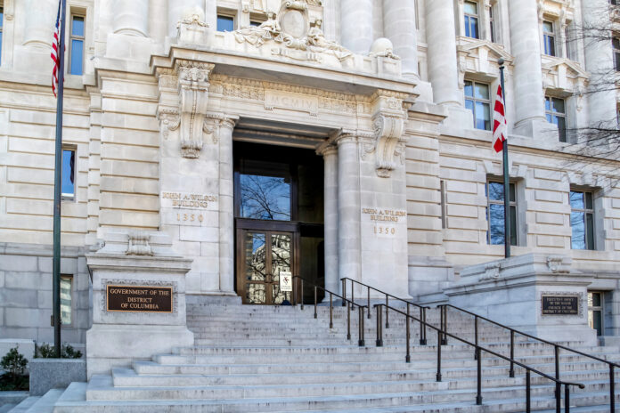 Washington D.C., USA - March 1, 2020: The entrance of John A. Wilson Building, which houses the Executive Office of the Mayor and the Council of the District of Columbia.