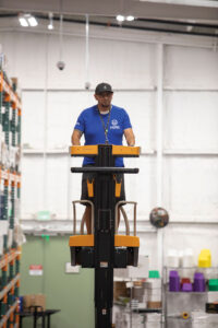 Herbl cannabis Warehouse worker on lift