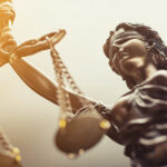 13 Ladies Who Litigate statue of the scales of justice women lawyers cannabis industry