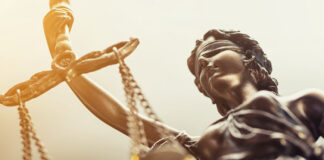 13 Ladies Who Litigate statue of the scales of justice women lawyers cannabis industry