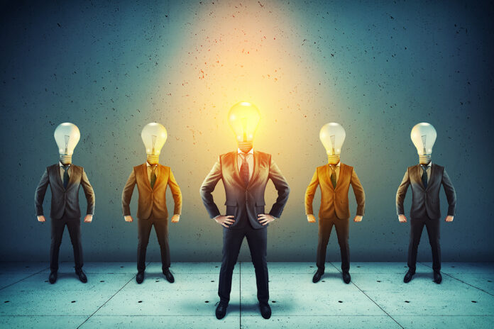 Group of businessman with lightbulbs instead of head.Elite business team .Out of the box concept.